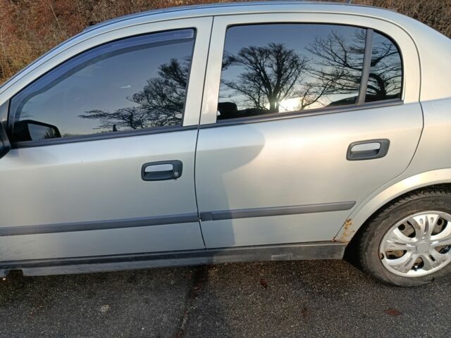 Серый Опель Астра, объемом двигателя 1.4 л и пробегом 342 тыс. км за 2200 $, фото 4 на Automoto.ua