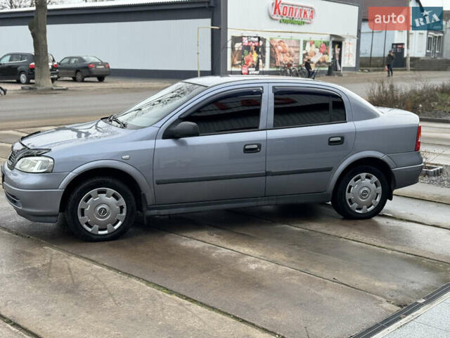 Серый Опель Астра, объемом двигателя 1.4 л и пробегом 188 тыс. км за 3800 $, фото 3 на Automoto.ua