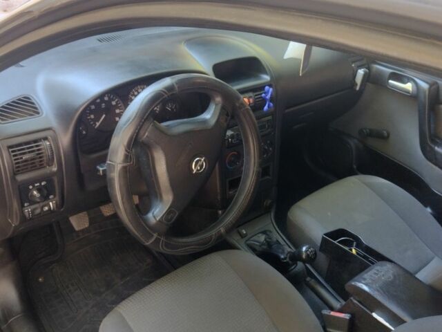 Серый Опель Астра, объемом двигателя 1.4 л и пробегом 216 тыс. км за 4000 $, фото 5 на Automoto.ua