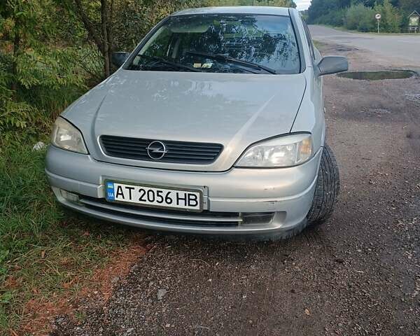 Серый Опель Астра, объемом двигателя 1.4 л и пробегом 235 тыс. км за 2300 $, фото 3 на Automoto.ua