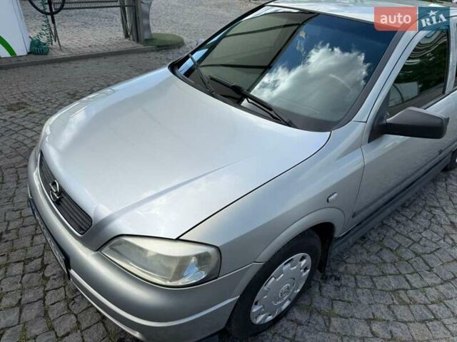 Серый Опель Астра, объемом двигателя 1.4 л и пробегом 211 тыс. км за 3200 $, фото 7 на Automoto.ua