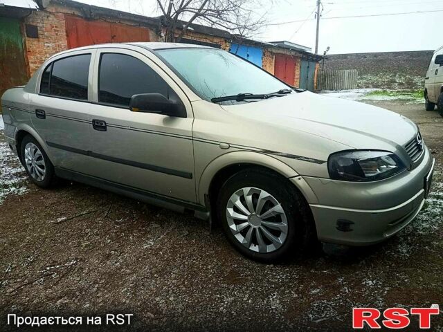 Серый Опель Астра, объемом двигателя 1.6 л и пробегом 250 тыс. км за 2600 $, фото 1 на Automoto.ua