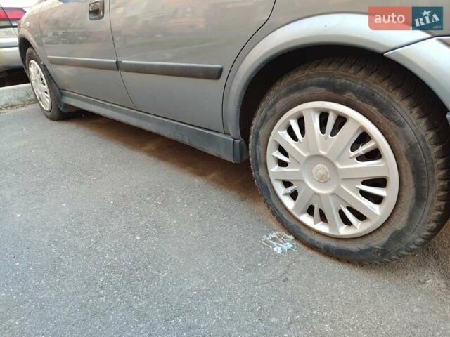 Серый Опель Астра, объемом двигателя 1.39 л и пробегом 190 тыс. км за 4100 $, фото 6 на Automoto.ua