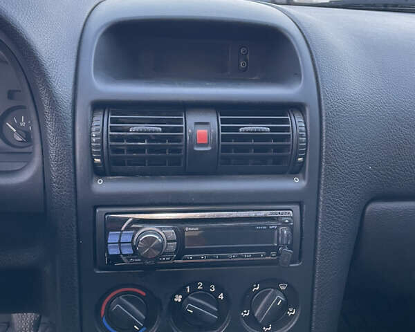 Серый Опель Астра, объемом двигателя 1.4 л и пробегом 293 тыс. км за 3600 $, фото 8 на Automoto.ua