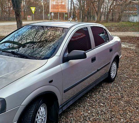 Серый Опель Астра, объемом двигателя 1.4 л и пробегом 23400 тыс. км за 2500 $, фото 5 на Automoto.ua
