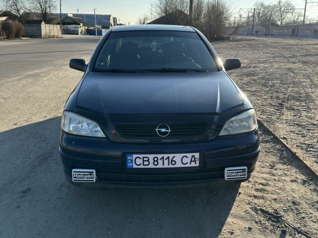 Серый Опель Астра, объемом двигателя 1.4 л и пробегом 225 тыс. км за 3650 $, фото 2 на Automoto.ua