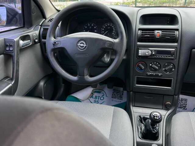 Серый Опель Астра, объемом двигателя 1.6 л и пробегом 283 тыс. км за 4000 $, фото 5 на Automoto.ua