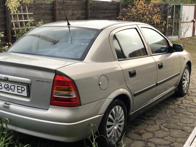 Серый Опель Астра, объемом двигателя 1.4 л и пробегом 207 тыс. км за 3500 $, фото 2 на Automoto.ua