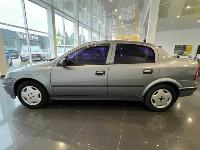 Сірий Опель Астра, об'ємом двигуна 1.4 л та пробігом 245 тис. км за 3650 $, фото 3 на Automoto.ua