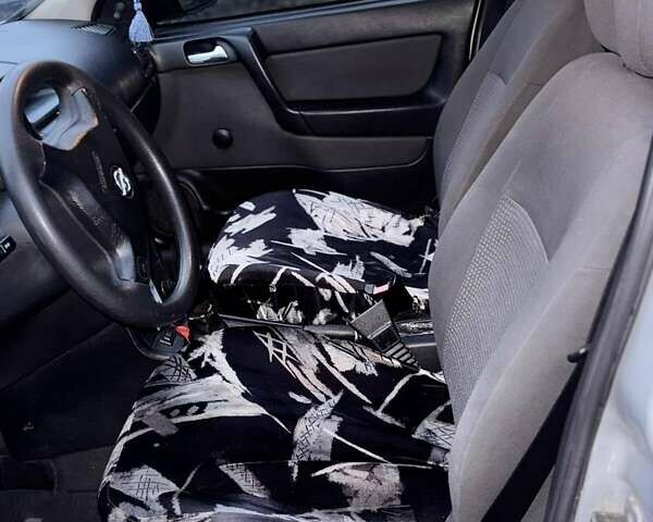 Серый Опель Астра, объемом двигателя 1.4 л и пробегом 140 тыс. км за 4500 $, фото 9 на Automoto.ua