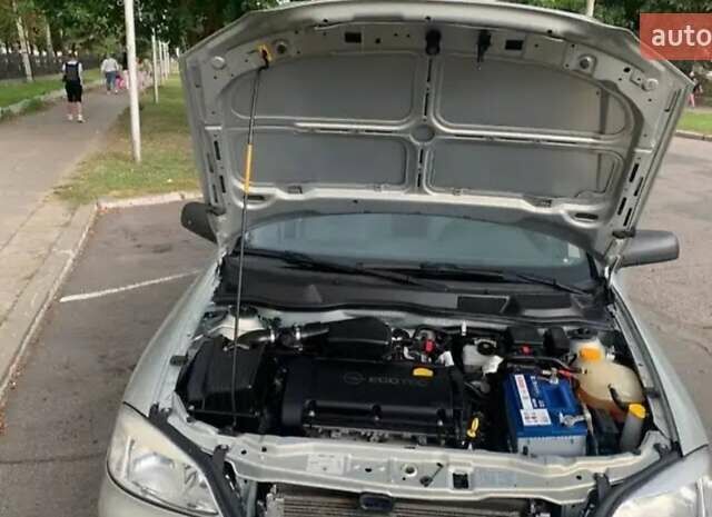 Серый Опель Астра, объемом двигателя 1.6 л и пробегом 59 тыс. км за 6999 $, фото 4 на Automoto.ua