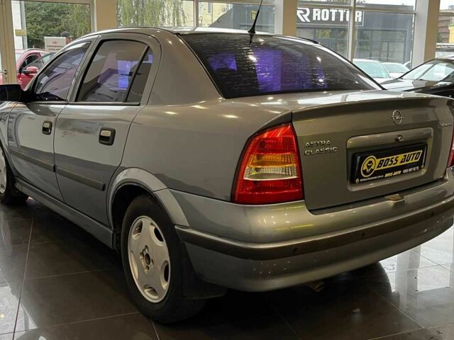 Сірий Опель Астра, об'ємом двигуна 1.4 л та пробігом 245 тис. км за 3650 $, фото 4 на Automoto.ua