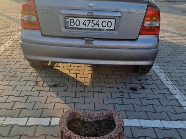 Серый Опель Астра, объемом двигателя 1.4 л и пробегом 173 тыс. км за 2900 $, фото 7 на Automoto.ua