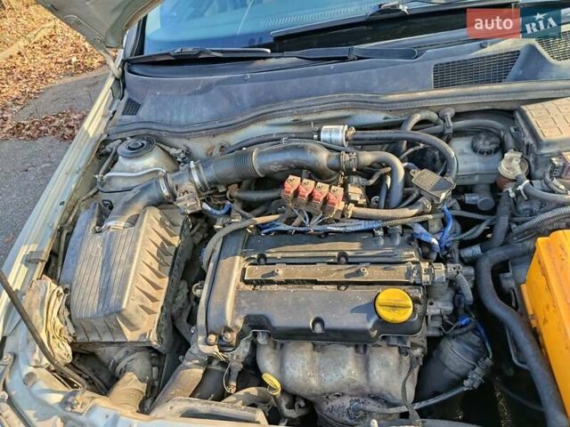 Серый Опель Астра, объемом двигателя 1.4 л и пробегом 342 тыс. км за 2200 $, фото 8 на Automoto.ua