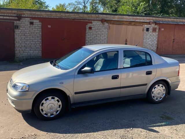 Серый Опель Астра, объемом двигателя 1.4 л и пробегом 100 тыс. км за 4700 $, фото 12 на Automoto.ua