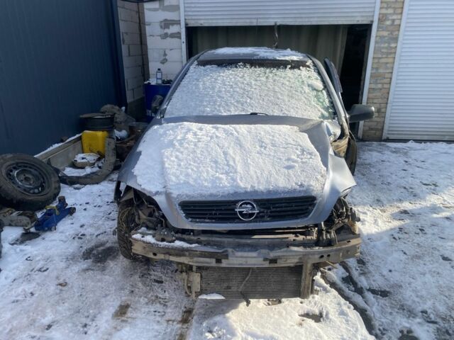 Серый Опель Астра, объемом двигателя 1.4 л и пробегом 250 тыс. км за 1299 $, фото 1 на Automoto.ua