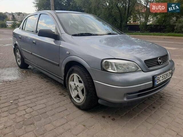 Серый Опель Астра, объемом двигателя 1.4 л и пробегом 105 тыс. км за 3400 $, фото 4 на Automoto.ua