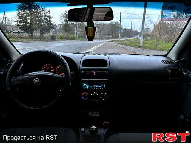 Серый Опель Астра, объемом двигателя 1.4 л и пробегом 201 тыс. км за 3450 $, фото 10 на Automoto.ua