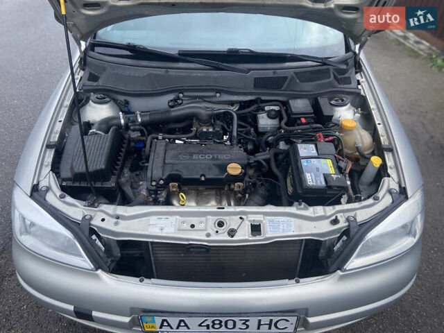 Серый Опель Астра, объемом двигателя 1.4 л и пробегом 104 тыс. км за 3900 $, фото 19 на Automoto.ua