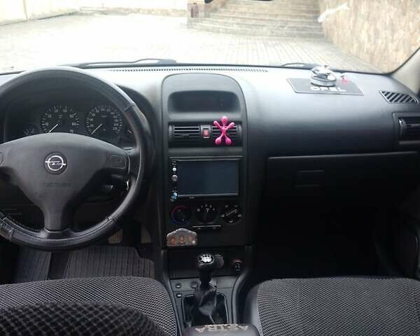 Серый Опель Астра, объемом двигателя 1.36 л и пробегом 160 тыс. км за 4200 $, фото 6 на Automoto.ua