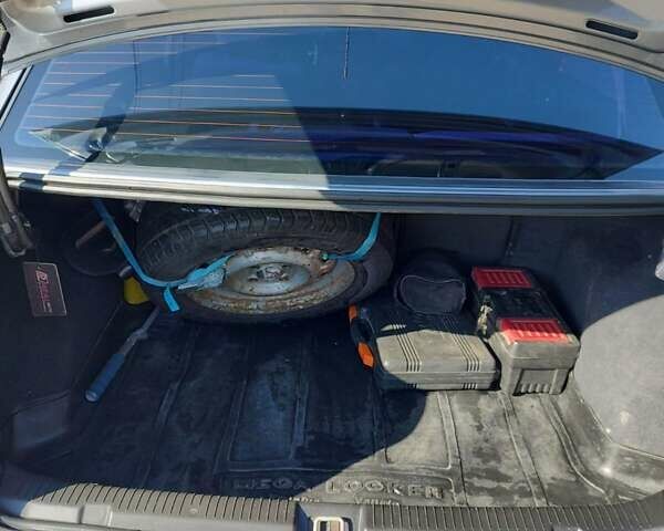 Серый Опель Астра, объемом двигателя 1.4 л и пробегом 213 тыс. км за 3700 $, фото 10 на Automoto.ua