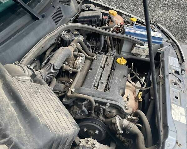 Серый Опель Астра, объемом двигателя 1.4 л и пробегом 122 тыс. км за 1500 $, фото 3 на Automoto.ua