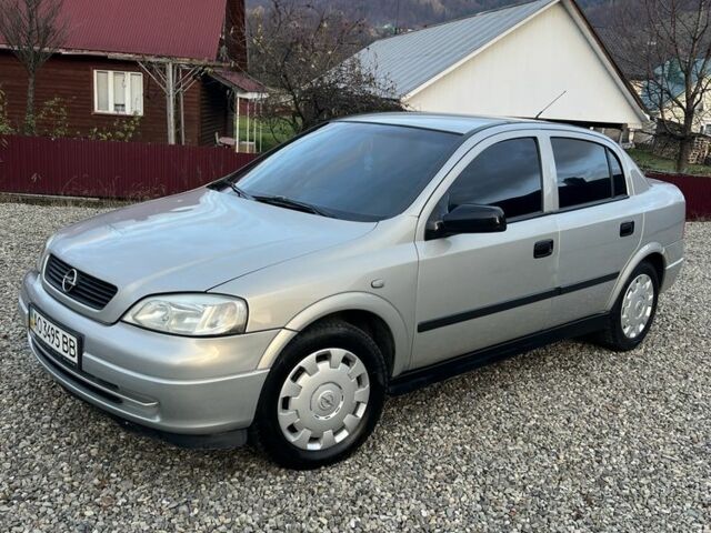 Серый Опель Астра, объемом двигателя 1.4 л и пробегом 158 тыс. км за 3250 $, фото 2 на Automoto.ua