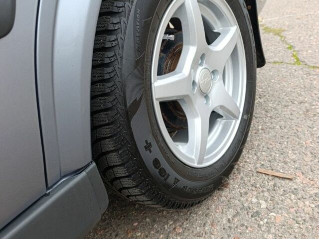 Серый Опель Астра, объемом двигателя 1.4 л и пробегом 77 тыс. км за 4400 $, фото 6 на Automoto.ua