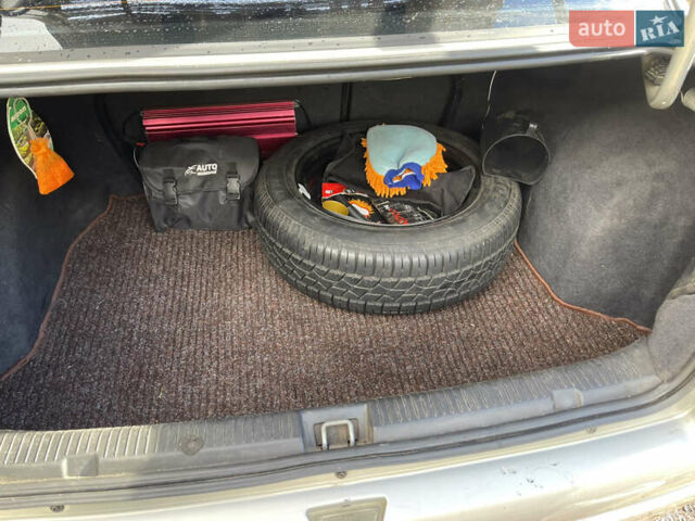 Серый Опель Астра, объемом двигателя 1.4 л и пробегом 326 тыс. км за 4200 $, фото 11 на Automoto.ua