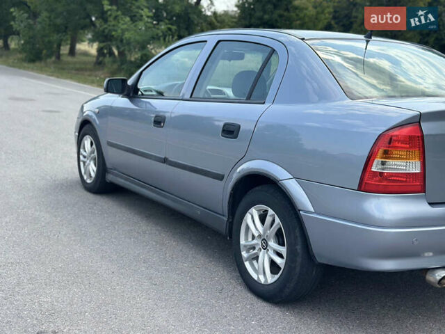 Сірий Опель Астра, об'ємом двигуна 1.6 л та пробігом 230 тис. км за 4700 $, фото 7 на Automoto.ua