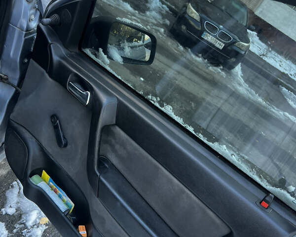 Сірий Опель Астра, об'ємом двигуна 1.4 л та пробігом 236 тис. км за 3500 $, фото 3 на Automoto.ua