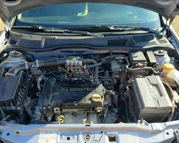 Серый Опель Астра, объемом двигателя 1.4 л и пробегом 213 тыс. км за 3700 $, фото 9 на Automoto.ua