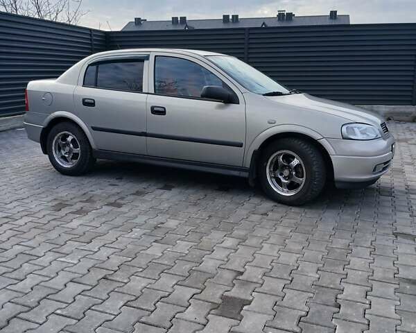 Серый Опель Астра, объемом двигателя 1.6 л и пробегом 98 тыс. км за 4500 $, фото 2 на Automoto.ua