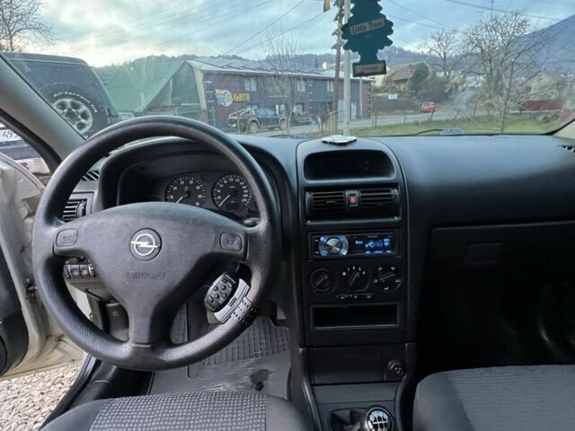 Серый Опель Астра, объемом двигателя 1.4 л и пробегом 158 тыс. км за 3250 $, фото 6 на Automoto.ua