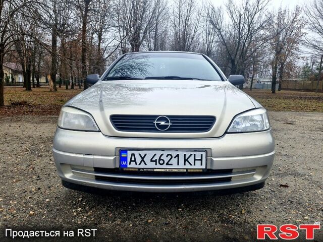Серый Опель Астра, объемом двигателя 1.4 л и пробегом 183 тыс. км за 4200 $, фото 2 на Automoto.ua