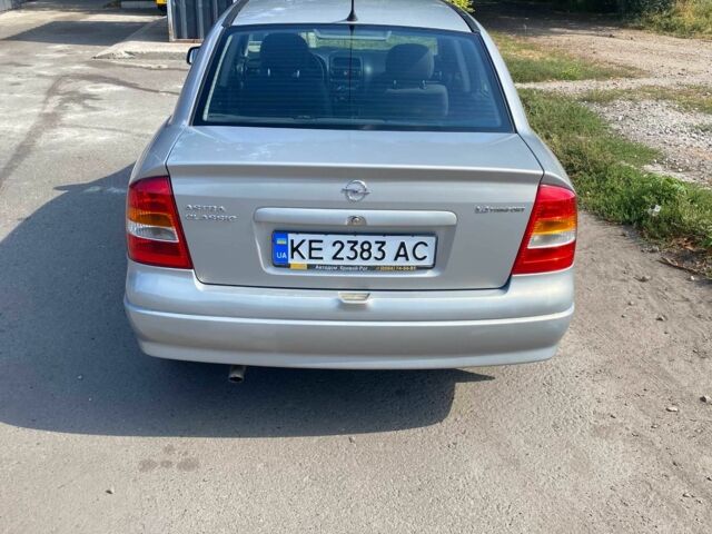 Серый Опель Астра, объемом двигателя 1.4 л и пробегом 100 тыс. км за 4700 $, фото 2 на Automoto.ua