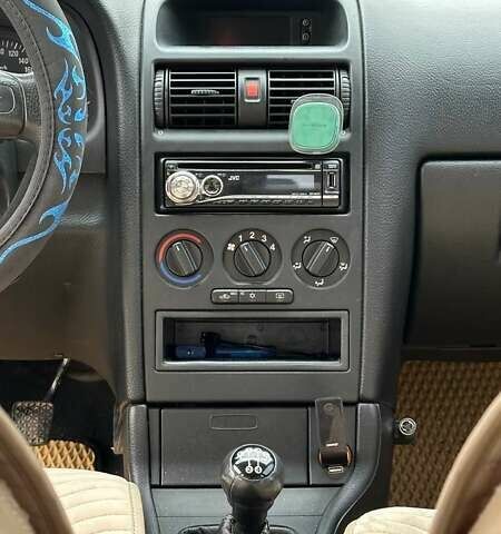 Серый Опель Астра, объемом двигателя 1.6 л и пробегом 179 тыс. км за 4000 $, фото 29 на Automoto.ua