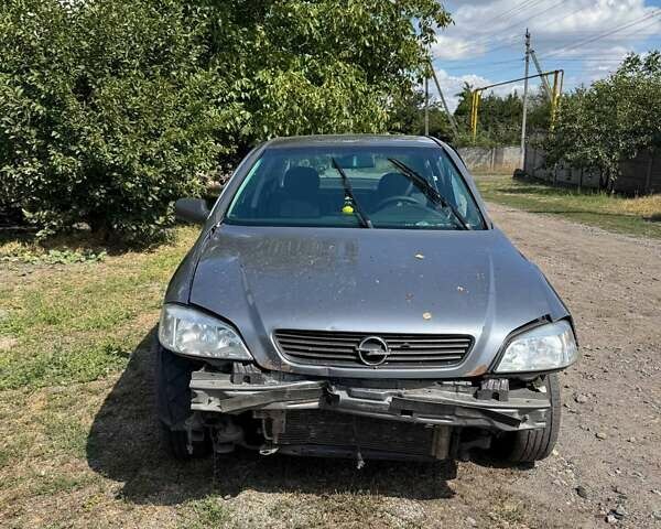 Серый Опель Астра, объемом двигателя 1.4 л и пробегом 122 тыс. км за 1500 $, фото 2 на Automoto.ua