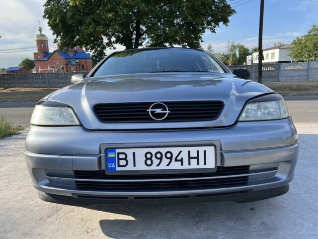 Серый Опель Астра, объемом двигателя 1.6 л и пробегом 189 тыс. км за 3999 $, фото 17 на Automoto.ua