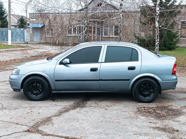 Серый Опель Астра, объемом двигателя 1 л и пробегом 400 тыс. км за 3500 $, фото 2 на Automoto.ua