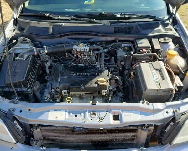 Серый Опель Астра, объемом двигателя 1.4 л и пробегом 213 тыс. км за 3700 $, фото 11 на Automoto.ua