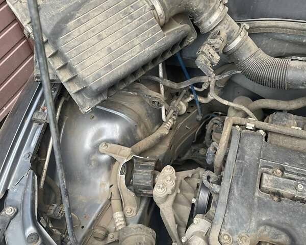 Серый Опель Астра, объемом двигателя 1.4 л и пробегом 122 тыс. км за 1500 $, фото 5 на Automoto.ua