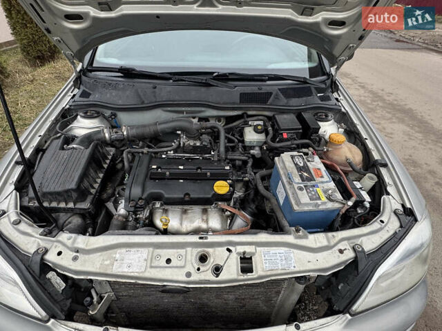 Сірий Опель Астра, об'ємом двигуна 1.4 л та пробігом 218 тис. км за 4000 $, фото 20 на Automoto.ua