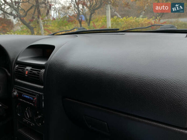 Опель Астра 2008 у Червоноград на Automoto.ua Сірий Опель Астра, об'ємом двигуна 1.6 л та пробігом 193 тис. км за 5300 $, фото 19 на Automoto.ua