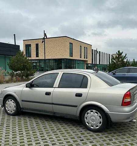 Серый Опель Астра, объемом двигателя 1.6 л и пробегом 179 тыс. км за 4000 $, фото 7 на Automoto.ua