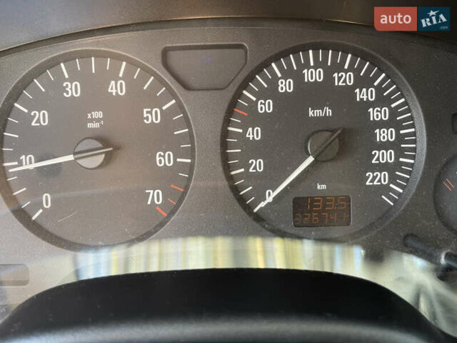 Серый Опель Астра, объемом двигателя 1.4 л и пробегом 326 тыс. км за 4200 $, фото 7 на Automoto.ua