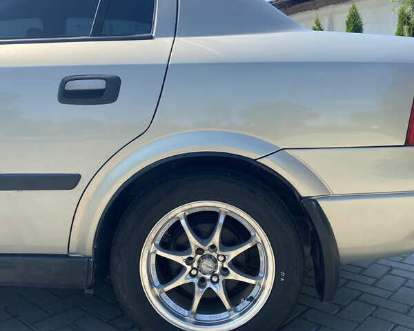 Сірий Опель Астра, об'ємом двигуна 1.4 л та пробігом 134 тис. км за 4999 $, фото 12 на Automoto.ua