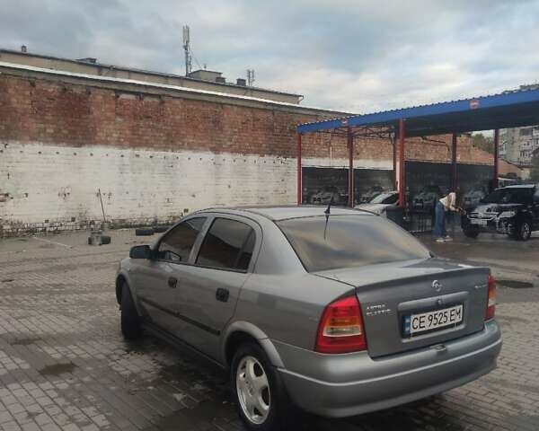 Серый Опель Астра, объемом двигателя 1.6 л и пробегом 298 тыс. км за 4200 $, фото 6 на Automoto.ua