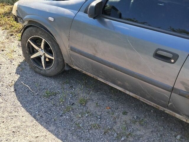 Серый Опель Астра, объемом двигателя 0 л и пробегом 135 тыс. км за 1000 $, фото 2 на Automoto.ua