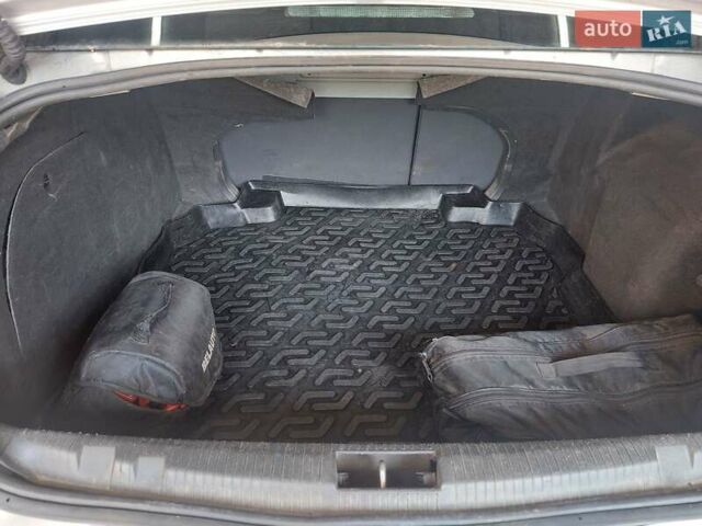 Серый Опель Астра, объемом двигателя 1.8 л и пробегом 286 тыс. км за 6000 $, фото 6 на Automoto.ua